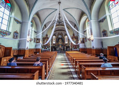 Zalipie, Poland - May 13, 2018: Main Nave Of St Joseph Church In Zalipie Village, Known For A Custom Of Painting Buildings With Floral Motifs