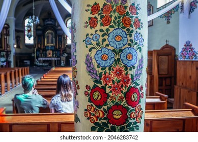 Zalipie, Poland - May 13, 2018: St Joseph Church In Zalipie Village, Known For A Custom Of Painting Buildings With Floral Motifs