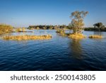 Zambezi sunset boat cruise on the Zambezi River at Victoria Falls, Mosi-oa-Tunya, is a waterfall on the Zambezi River, located on the border between Zambia and Zimbabwe.