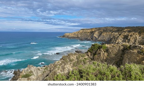 Zambujeira Do Mar Beach, Alentejo, Portugal. Portugal Hiking Rota Vicentina the Fisherman's Trail Along the Alentejo Coastline to Wild and Rugged Beaches Narrow Cliff Side Paths. - Powered by Shutterstock