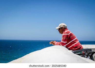 Zambujeira Do Mar, Portugal - June 28, 2021: Local Portuguese Man Looking Ahead By The Seaside