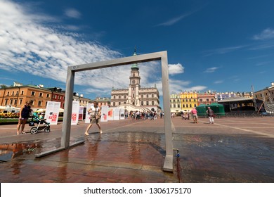 ZAMOSC, POLAND -  8 JUL: Daily Life In Zamosc On JUL 8, 2018. Town Hall At The Center Of The Old Town In Zamosc