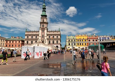 ZAMOSC, POLAND -  8 JUL: Daily Life In Zamosc On JUL 8, 2018. Town Hall At The Center Of The Old Town In Zamosc