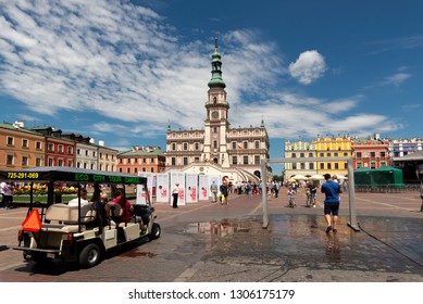 ZAMOSC, POLAND -  8 JUL: Daily Life In Zamosc On JUL 8, 2018. Town Hall At The Center Of The Old Town In Zamosc