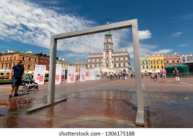 ZAMOSC, POLAND -  8 JUL: Daily Life In Zamosc On JUL 8, 2018. Town Hall At The Center Of The Old Town In Zamosc