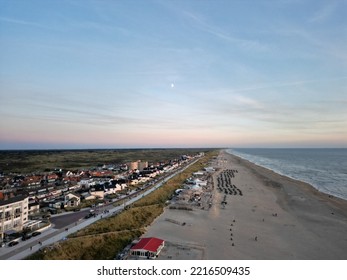 ZANDVOORT, NETHERLANDS - Aug 17, 2022: A Bird's Eye View Of Houses Against A Boulevard On Zandvoort Beach, The Netherlands At Sunset