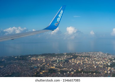 Zanzibar, Tanzania - october 28, 2019 : Wing of the FlyDubai airplane during a flight