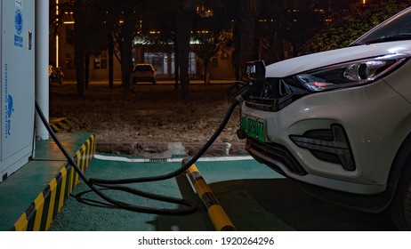 Zaozhuang, China, On The Night Of February 19, A New Energy Vehicle Made In China In 2021 Is Charging At A Charging Station