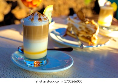 Zaperoco Caffee And Cake On The Table In Golden Sun. Tenerife,  Puerto De La Cruz, Tarao Garden.