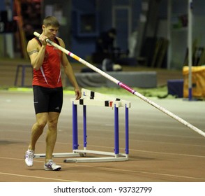 ZAPORIZHIA, UKRAINE - JAN.27: Denys Yurchenko on the Ukrainian Cup in Athletics, on January 27, 2012 in Zaporizhia, Ukraine. He won bronze medal in the pole vault event at  Summer Olympics in Beijing.