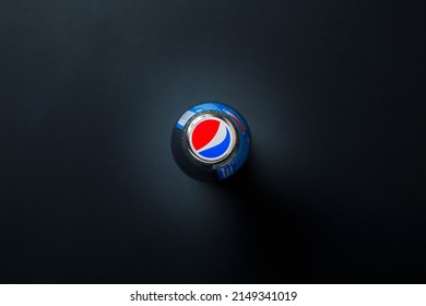 Zaporizhzhia, Ukraine - April 22, 2022: Pepsi cola glass bottle with cap. top view