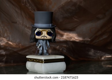 Zaporizhzhia, Ukraine - August 4, 2022: Illustrative Editorial Of Funko Pop Vinyl Action Figure Of Bram Stoker's Dracula Vampire. Prince Vlad Standing On Vintage Jewelry Box Like Coffin In Dark Room. 