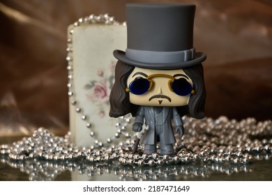 Zaporizhzhia, Ukraine - August 4, 2022: Illustrative Editorial Of Funko Pop Action Figure Of Bram Stoker's Dracula. Toy Standing On Marble Table In Dark Room. Exquisite Vintage Jewelry Box, Necklace. 