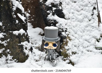 Zaporizhzhia, Ukraine - February 4, 2022: Illustrative editorial of Funko Pop action figure of Bram Stoker's Dracula (prince Vlad). Vinyl toy standing between snowy rocks in winter forest.