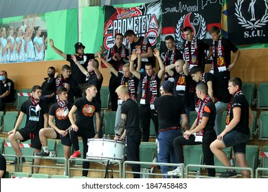 ZAPOROZHYA, UKRAINE - 09/20/2020- Spectators And Fans Emotionally During The COVID19 Pandemic In Masks Support Their Team In Stands Of Indoor Sports Hall Of Stadium. Sports Fans During  COVID Epidemic