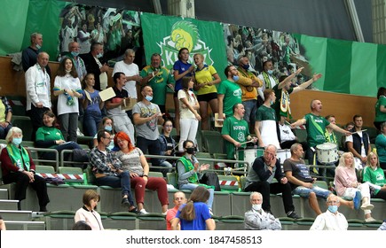 ZAPOROZHYA, UKRAINE - 09/20/2020- Spectators And Fans Emotionally During The COVID19 Pandemic In Masks Support Their Team In Stands Of Indoor Sports Hall Of Stadium. Sports Fans During  COVID Epidemic