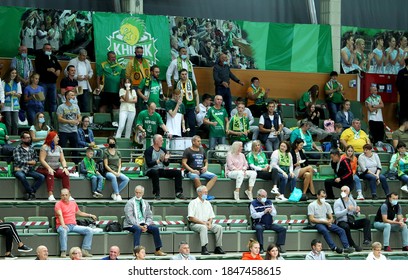 ZAPOROZHYA, UKRAINE - 09/20/2020- Spectators And Fans Emotionally During The COVID19 Pandemic In Masks Support Their Team In Stands Of Indoor Sports Hall Of Stadium. Sports Fans During  COVID Epidemic