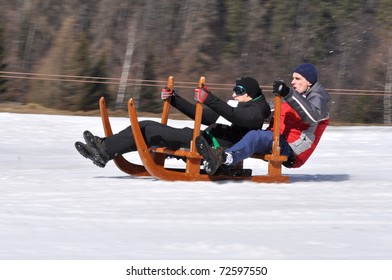 ZBOJSKA, SLOVAKIA - MARCH 5: Siman Matus Dan Siman Martin Of Slovak Republic Participate In The Horn Sleigh Downhill Ride March 5, 2011 In Zbojska, Slovakia.