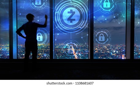 Zcash cryptocurrency security theme with man writing on large windows high above a sprawling city at night