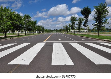 zebra traffic walk way with blue sky - Powered by Shutterstock