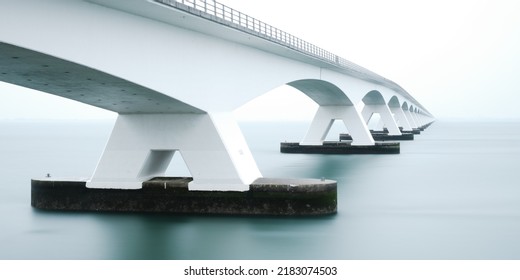 Zeeland bridge long exposure on a rainy day - panorama - Shutterstock ID 2183074503