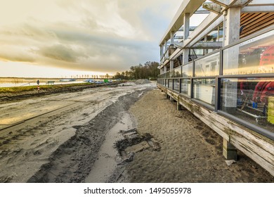 Zegerplas, Wet'n Wild, Alphen Aan Den Rijn, South Holland, Netherlands, March 19 2019: Remediation Of Contaminated Soil And Restoration Of Water Bottom, Outdoor Swimming Pool And Sandy Beach