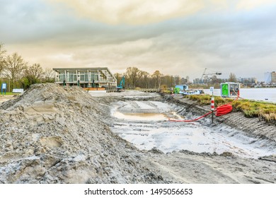 Zegerplas, Wet'n Wild, Alphen Aan Den Rijn, South Holland, Netherlands, March 19 2019: Remediation Of Contaminated Soil And Restoration Of Water Bottom, Outdoor Swimming Pool And Sandy Beach