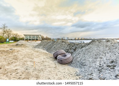 Zegerplas, Wet'n Wild, Alphen Aan Den Rijn, South Holland, Netherlands, March 19 2019: Remediation Of Contaminated Soil And Restoration Of Water Bottom, Outdoor Swimming Pool And Sandy Beach