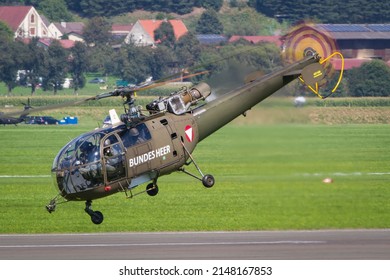 Zeltweg, Austria - 09.03.2016: Austrian Air Force Alluette III Helicopter Departing For A Rescue Mission In The Mountains