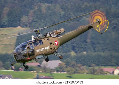 Zeltweg, Austria - 3 September 2016: Austrian Air Force Alluette III Helicopter Departing For A Rescue Mission In The Mountains