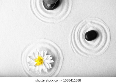 Zen Garden. Beautiful Lotus Flower And Stones On White Sand, Flat Lay