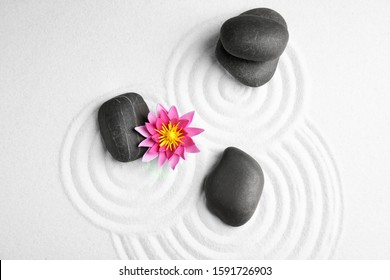 Zen Garden. Beautiful Lotus Flower And Stones On White Sand, Flat Lay