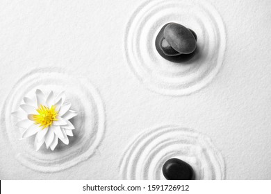 Zen Garden. Beautiful Lotus Flower And Stones On White Sand, Flat Lay