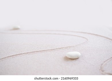 Zen Garden Japanese Pattern On White Sand Background. Buddhism Texture Wave On Desert Nature At Coast Of Shore. Top View Line Abstract On Beach With Stone. Purity Meditation Calm Or Lifestyles Spa. 