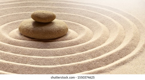 zen garden meditation stone background with stones and lines in sand for relaxation balance and harmony spirituality or spa wellness. - Shutterstock ID 1550374625