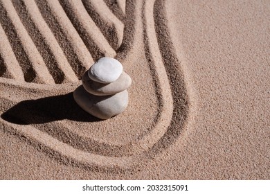 Zen Garden Stone Japanese On Raked Sand. Rock Or Pebbles On Beach Design Outdoor For Meditate Peace Of Mind And Relax. Chan Buddhism Religion Concept.