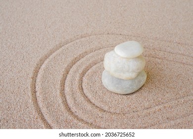 Zen Garden Stone Japanese On Raked Sand. Rock Or Pebbles On Beach Design Outdoor For Meditate Peace Of Mind And Relax. Chan Buddhism Religion Concept.