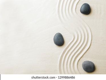 Zen Garden Stones On Sand With Pattern, Top View. Space For Text