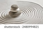 Zen garden with the stones and white sand pattern minimal scene Stack of Balanced Pebbles, zen pebbles, relax, massage, meditation, studio photography