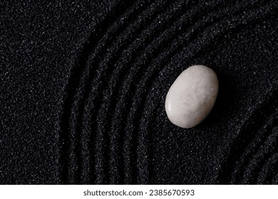 Zen Garden with White stone on Black Sand Wave Pattern in Japanese stye, Rock Sea Stone on Sand texture with the wave parallel lines pattern,Harmony,Meditation,Zen like concept - Powered by Shutterstock