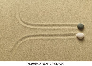 Zen Meditation Sand And Two Pebbles With Traces Walk A Path Together