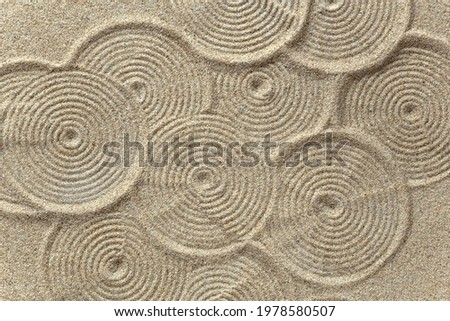Zen pattern in brown sand