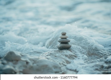 Zen Rocks And Violent Water. Calm Inside When Mess Is Around Concept.