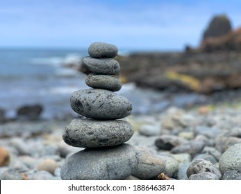 Zen Stone Column On A Rocky Beach