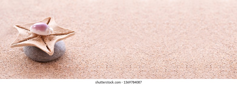 Zen stones, sand and seashells panoramic zen still life - Powered by Shutterstock