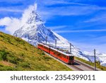 Zermatt, Switzerland. Gornergrat tourist train with Matterhorn mountain in the background. Valais region.