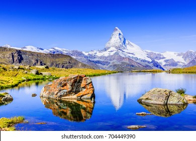 Zermatt, Switzerland. Matterhorn peak reflected in Stellisee Lake, Canton of Valais.