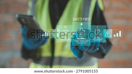 Zero accident and safety first concept industrial worker using smartphone with holographic hazard prevention and occupational health mobile app