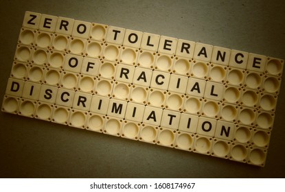 Zero Tolerance Of Racial Discrimination, Word Cube With Background.