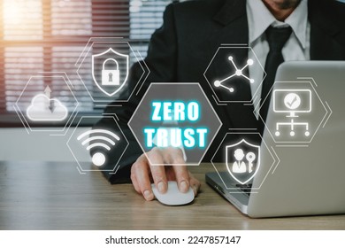 Zero trust security concept, Person using computer with zero trust icon on virtual screen.	